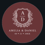 Burgundy White Crest Modern Monogram Wedding  Classic Round Sticker<br><div class="desc">Add a touch of elegance and warmth to your wedding with the Burgundy White Crest Modern Monogram Wedding Classic Round Sticker. Featuring a rich burgundy background, a refined white crest design, and a personalized monogram, this sticker is perfect for enhancing your wedding invitations, favors, or decor. Its classic yet modern...</div>