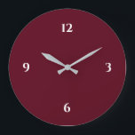 Burgundy Wine Colored Minimalist Large Clock<br><div class="desc">Modern clock features a minimalist design in a burgundy color palette with white accents. A simple plain design with white numbers on a burgundy wine colored background. A trendy addition to your kitchen, living room or office wall, a thoughtful modern office gift or modern home gift for any occasion. You...</div>