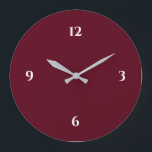 Burgundy Wine Colored Minimalist Large Clock<br><div class="desc">Modern clock features a minimalist design in a burgundy color palette with white accents. A simple plain design with white numbers on a burgundy wine colored background. A trendy addition to your kitchen, living room or office wall, a thoughtful modern office gift or modern home gift for any occasion. You...</div>