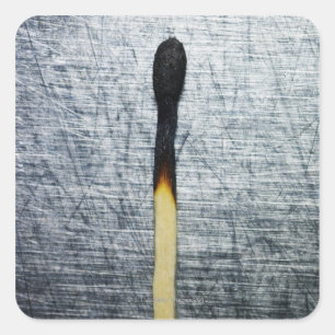 Burned match on stainless steel square sticker