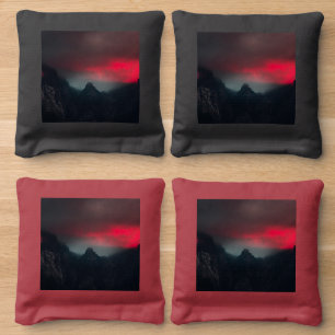 Burning clouds, fog and mountains cornhole bags