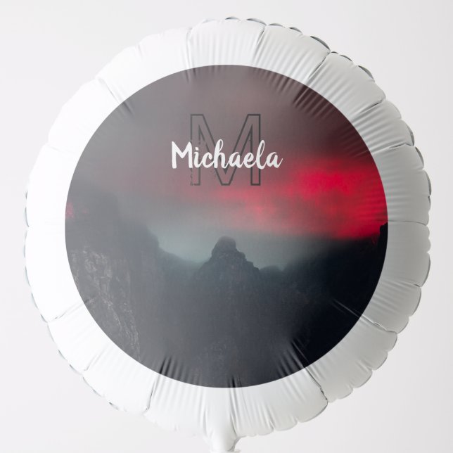 Burning clouds, fog and mountains monogram in sky balloon (Front)