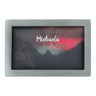 Burning clouds, fog and mountains monogram in sky belt buckle