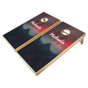 Burning clouds, fog and mountains monogram in sky cornhole set