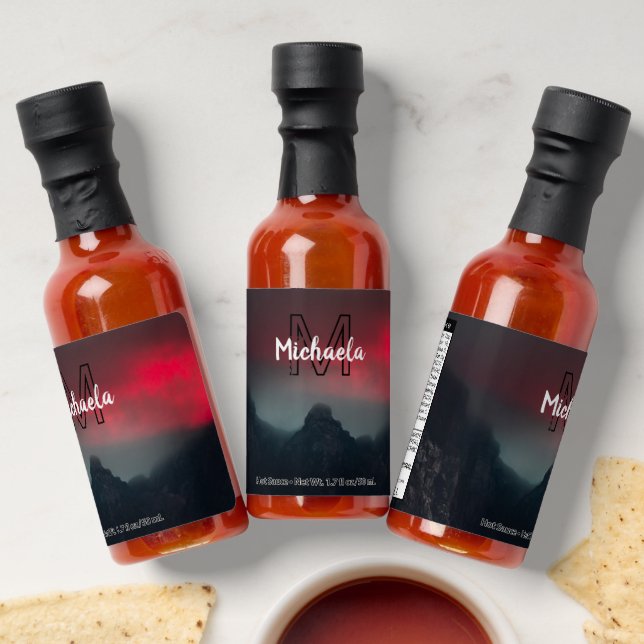 Burning clouds, fog and mountains monogram in sky hot sauces (Laydown)