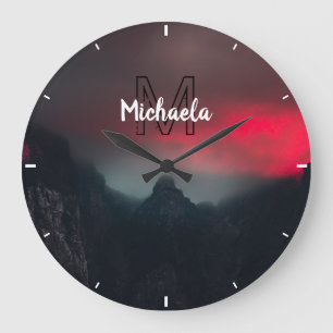 Burning clouds, fog and mountains monogram in sky large clock