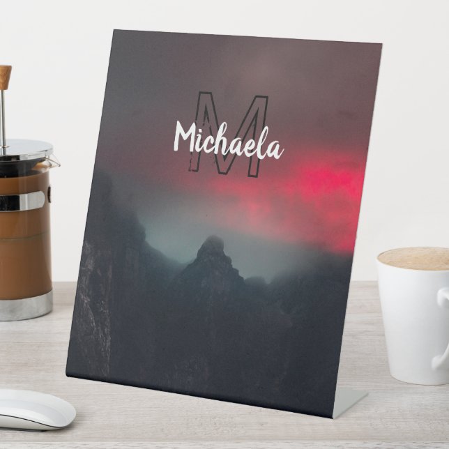 Burning clouds, fog and mountains monogram in sky pedestal sign (In SItu)