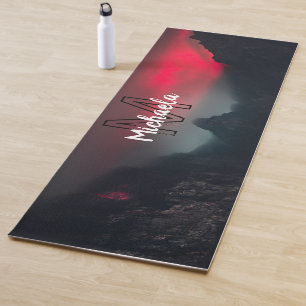 Burning clouds, fog and mountains monogram in sky yoga mat