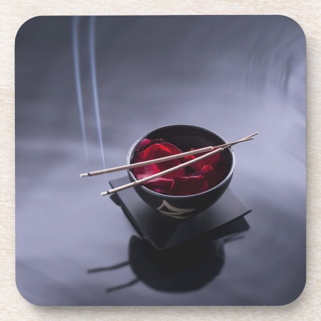 Burning incense on top of bowl of petals beverage coaster (Front)