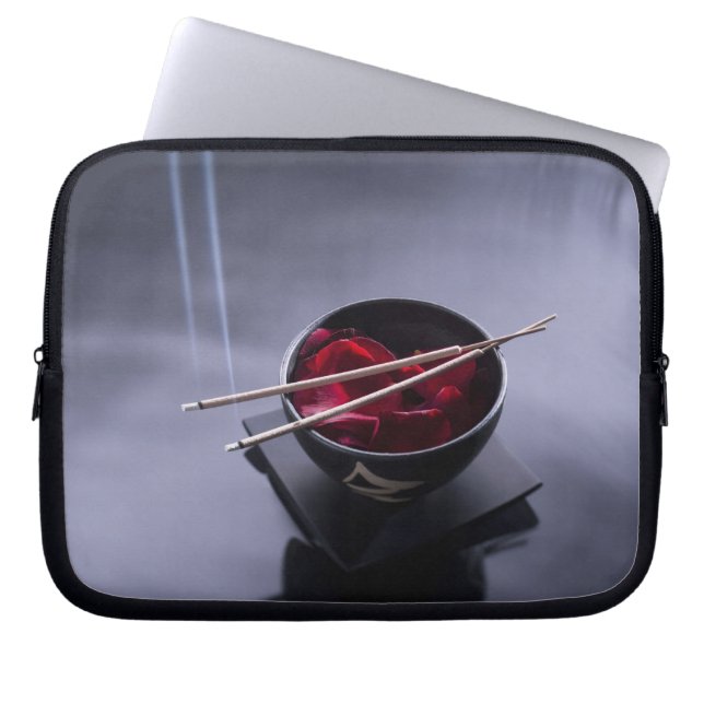 Burning incense on top of bowl of petals laptop sleeve (Front)