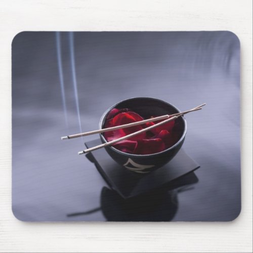 Burning incense on top of bowl of petals mouse pad