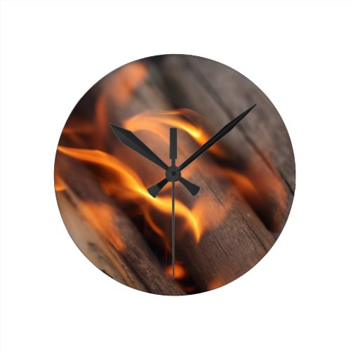 Burning wood branches round clock