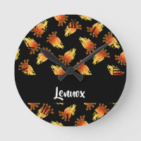 Burning wood pattern on black round clock