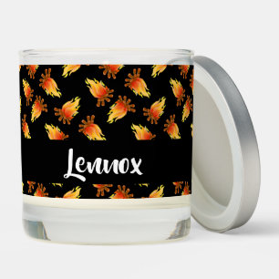 Burning wood pattern on black scented candle