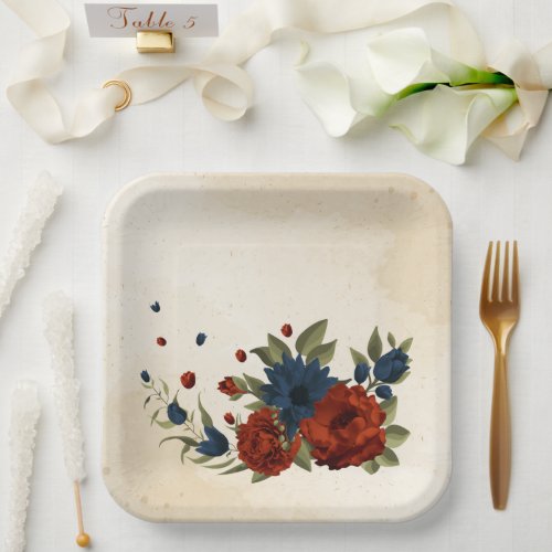 burnt orange and navy blue floral paper plates