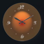 Burnt Orange/Brown Illuminated Design Wall Clock<br><div class="desc">An atmospheric clock with a brown border and illuminated burnt orange moon center.Complete with chic decay numerals.Different and original design by orientcourt zazzle. Also available in a square shape.</div>