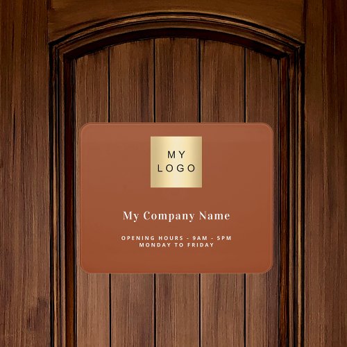 Burnt orange business logo name opening hours door sign