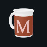 Burnt Orange Custom Monogram  Beverage Pitcher<br><div class="desc">A burnt orange background shows of a light pink custom Monogram.</div>