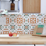 Burnt Orange Green White Aztec Geometric Tribal Ceramic Tile<br><div class="desc">Beautiful high quality original modern tribal boho folk pattern ceramic tile, designed in burnt orange and teal green color on a white background with geometric aztec icat pattern. Perfect for a fresh style modern interior design, for a stylish kitchen backsplash, bathroom or wall decoration with a hint of folk feel....</div>