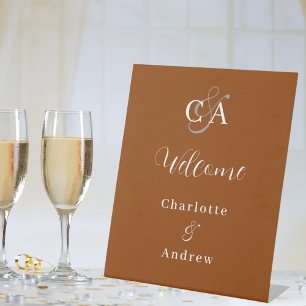 Burnt orange monogram modern wedding welcome pedestal sign