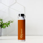 Burnt orange yellow custom name script water bottle<br><div class="desc">Burnt orange as background.  Personalize and add your name.   Yellow colored handwritten style script.</div>