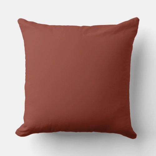 Burnt umber color background throw pillow