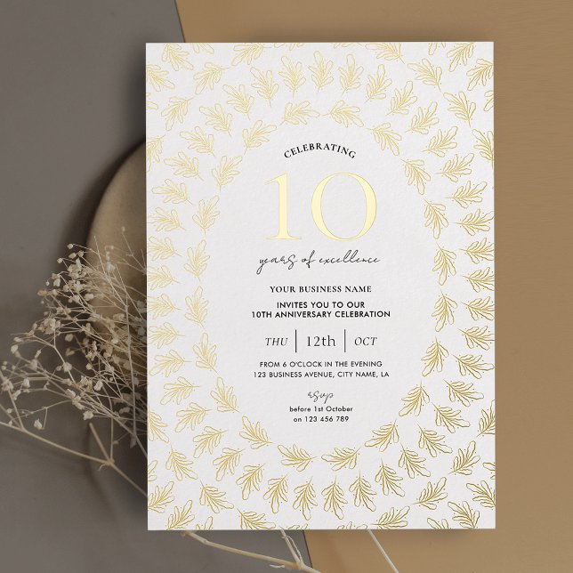 Business Anniversary Celebration Elegant Chic Foil Invitation (Elegant white & gold business anniversary party invitation with greenery frame printed in real foil)