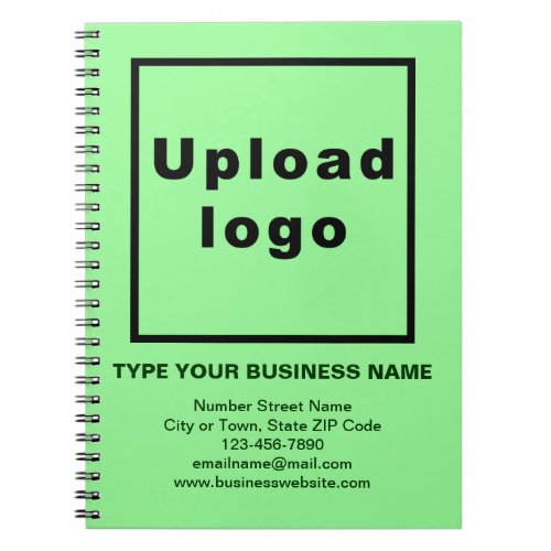 Business Brand on Light Green Notebook