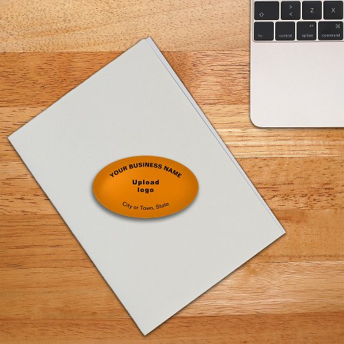 Business Brand on Orange Color Oval Shape Paperweight