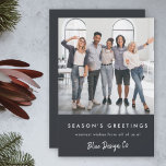 Business Christmas | Modern Stylish Team Photo Holiday Card<br><div class="desc">A stylish modern corporate business team photo flat holiday greeting card with a bold typography quote "Season's Greetings" in white with an off black background color. The greeting and company name can be easily customized to suit your own business. The design featues an optional message for your customers overleaf to...</div>