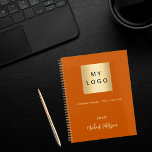 Business logo burnt orange elegant monogram 2024 planner<br><div class="desc">A trendy burnt orange colored background.  Personalize and add your business,  company logo,  a text,  year and personal name.  Golden letters.  If you want it without text,  use your back-space key to delete.
Add your own website address on the back.</div>