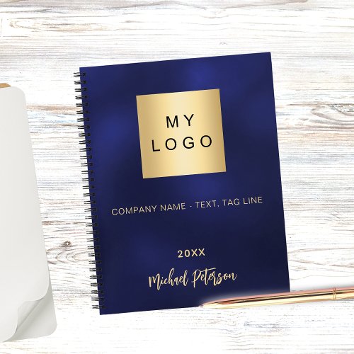 Business logo navy blue gold name year notebook
