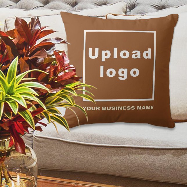 Business Name and Logo on Brown Throw Pillow (Brown throw pillow with your business name and logo displayed on sofa in a business lobby)