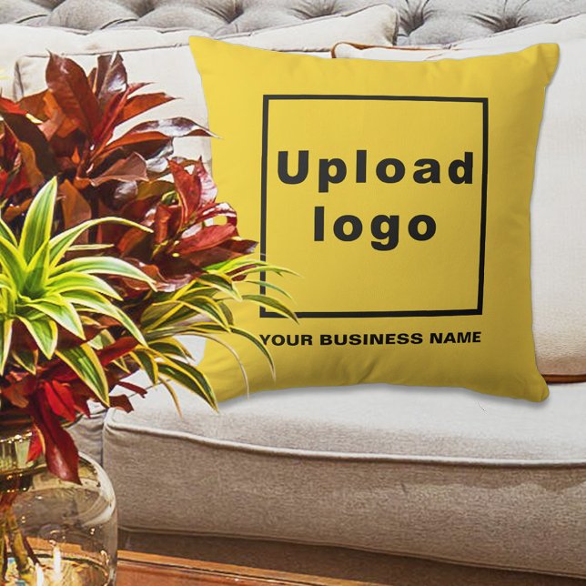 Business Name and Logo on Yellow Throw Pillow (Yellow throw pillow with your business name and logo displayed on sofa in a business lobby)