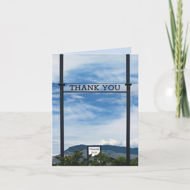 BUSINESS THANK YOU ON SIGN POST & BLUE SKY ABOVE (Front)