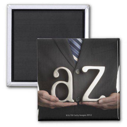 Businessman with A to Z letters Magnet