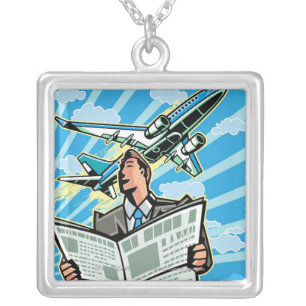 Businessman with newspaper and airplane above silver plated necklace