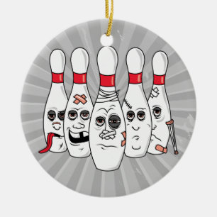 busted up injured bowling pins cartoon ceramic ornament