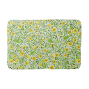 Buttercups on white bath mat