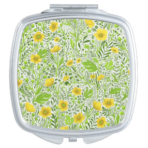 Buttercups on white compact mirror