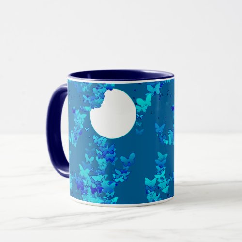 Butterflies against blue night sky moonscape mug