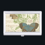 Butterflies on Sheet Music with Floral Design Business Card Holder<br><div class="desc">A green floral design and sheet music serves as the background to a trio of butterflies in this piece by Vision Studio. The French word for butterfly, papillon, is emblazoned at the bottom of the piece as well. If you have a strong love of butterflies, nature, or just like surrounding...</div>