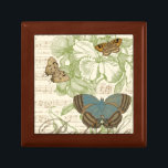 Butterflies on Sheet Music with Floral Design Jewelry Box<br><div class="desc">A green floral design and sheet music serves as the background to a trio of butterflies in this piece by Vision Studio. The French word for butterfly, papillon, is emblazoned at the bottom of the piece as well. If you have a strong love of butterflies, nature, or just like surrounding...</div>