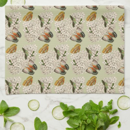 Butterflies on vintage green kitchen towel