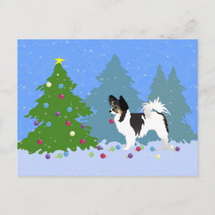 Butterfly Dog Decorating Christmas Tree in Forest Holiday Postcard