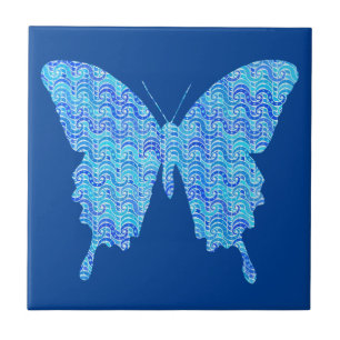 Butterfly image, abstract pattern, shades of blue ceramic tile