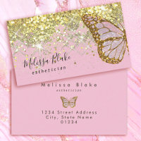 butterfly logo on faux gold sparkle