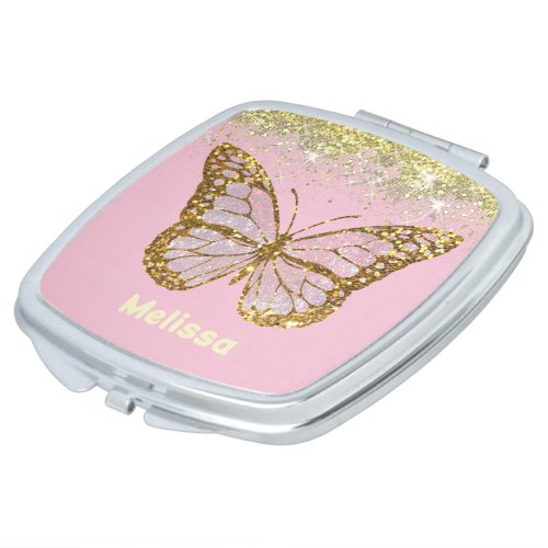 butterfly logo on faux gold sparkle compact mirror