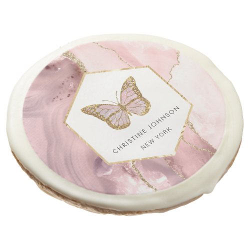 butterfly logo on pink agate  sugar cookie