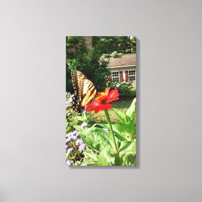 Butterfly on Flower in Front of House - Vertical Canvas Print (Front)